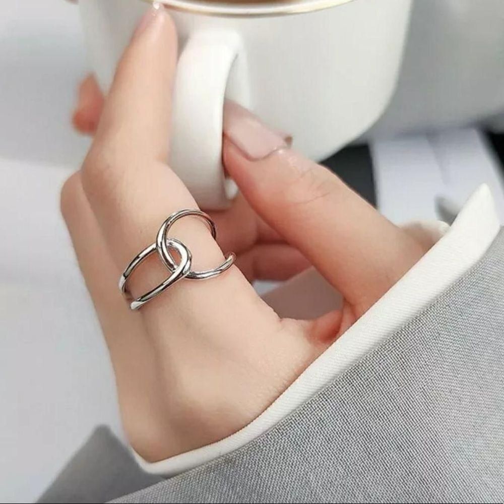 The Loop Ring in 925 silver adjustable sizing.